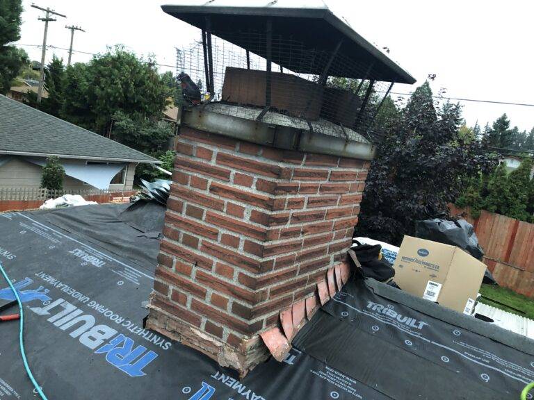 chimney on a roof before roofing shingles are placed