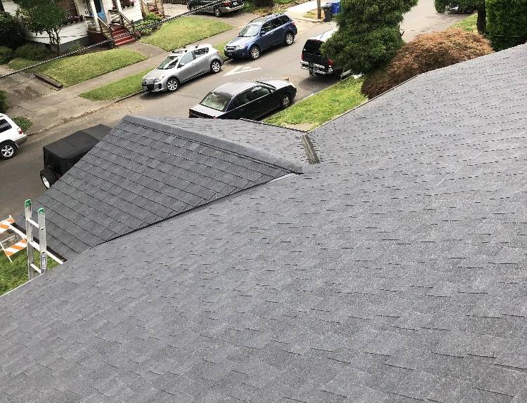 new asphalt roof shingles on a roof