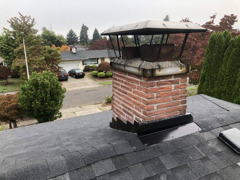 chimney with metal flashings on it roofing